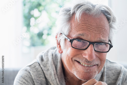 Portrait of smiling senior man photo