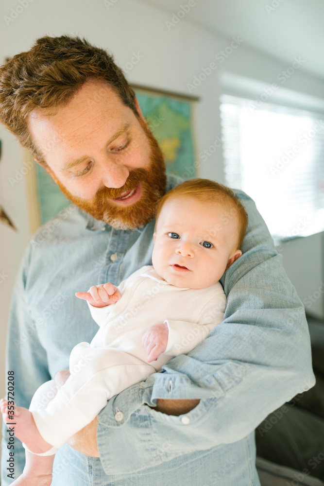 Father holding baby boy (2-3 months) Father holding baby boy (2-3 months)