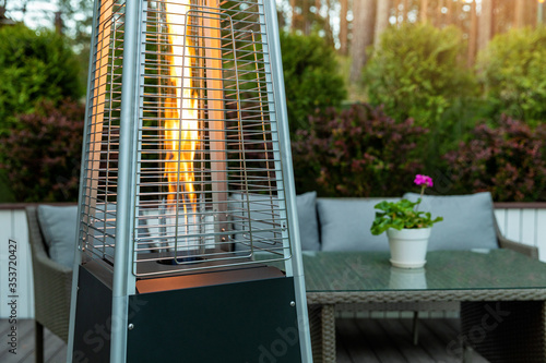 outdoor gas pyramid heater working on terrace