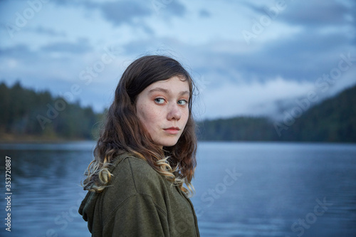 Portrait of girl by lake