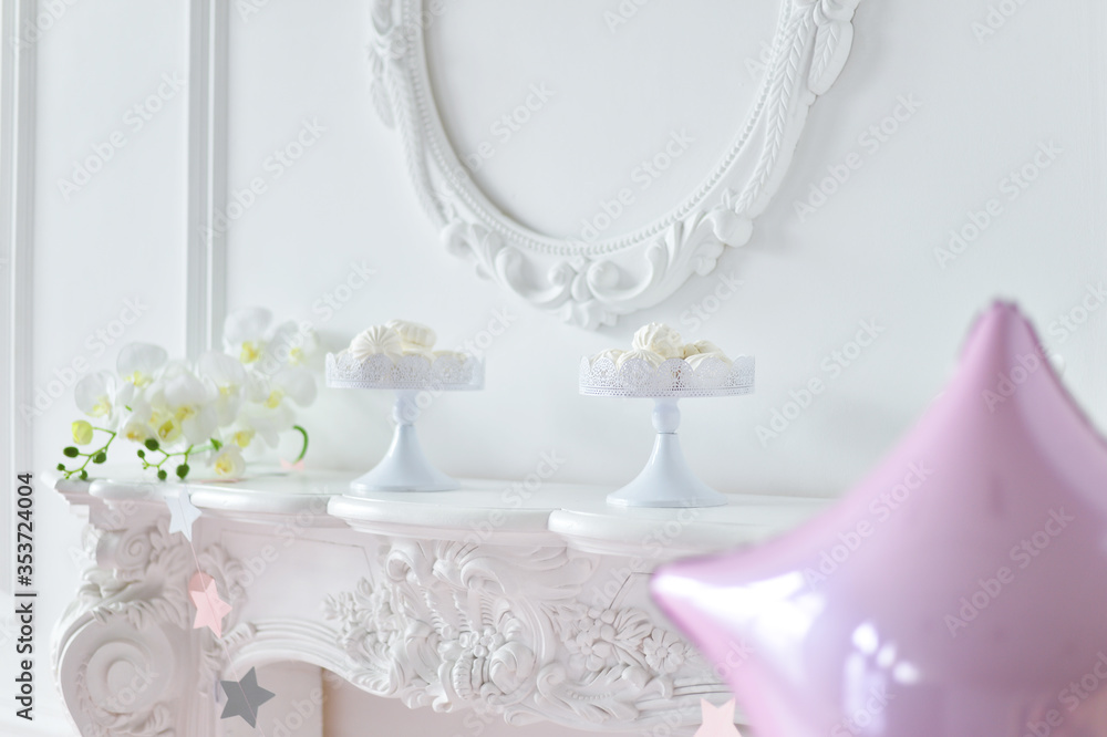 One year birthday decorations. A lot of balloons pink and white colors. One year birthday decorations. A lot of balloons pink and white colors.