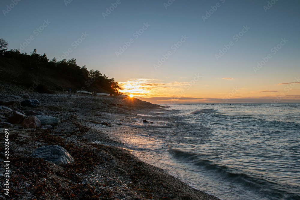 Low Sunset Overcobblestone beach, Sweden