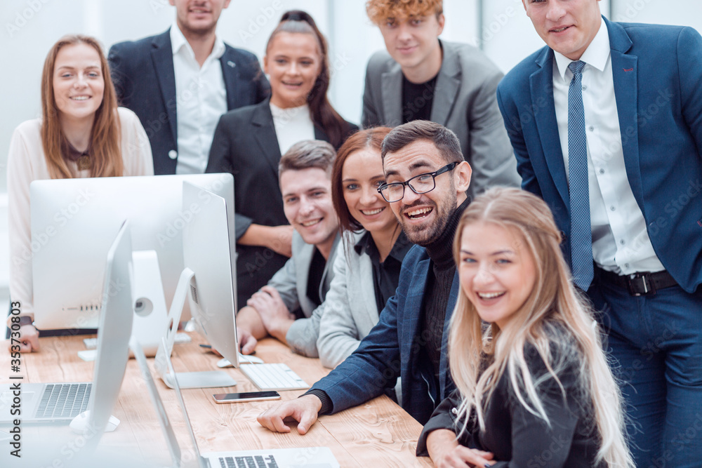 portrait of a happy business team at an office Desk portrait of a happy business team at an office Desk