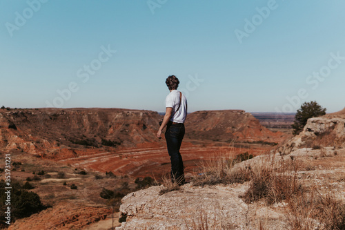 Photographer in canyon