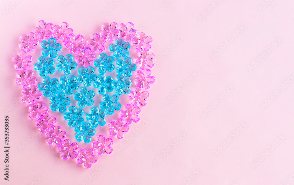Beautiful heart of pink and blue glass transparent flowers. Concept Of Valentine's Day. Place for Copyspace