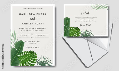 Wedding invitation card template set with tropical leaves decoration Premium Vector