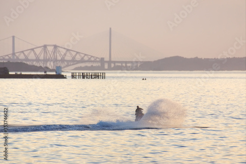 Canvas Print Man travelling a jet ski on the Firth of Forth