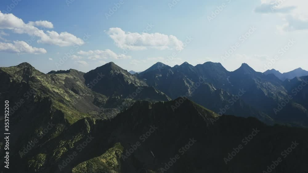 Drone shot of rocky mountain range skyline. Pyrenees, Andorra, 2020