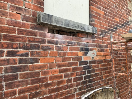 old brick wall with red bricks