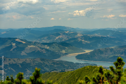 Beautiful view from Ceahlau mountain over the "Izvorul Muntelui" lake valley (Romania)