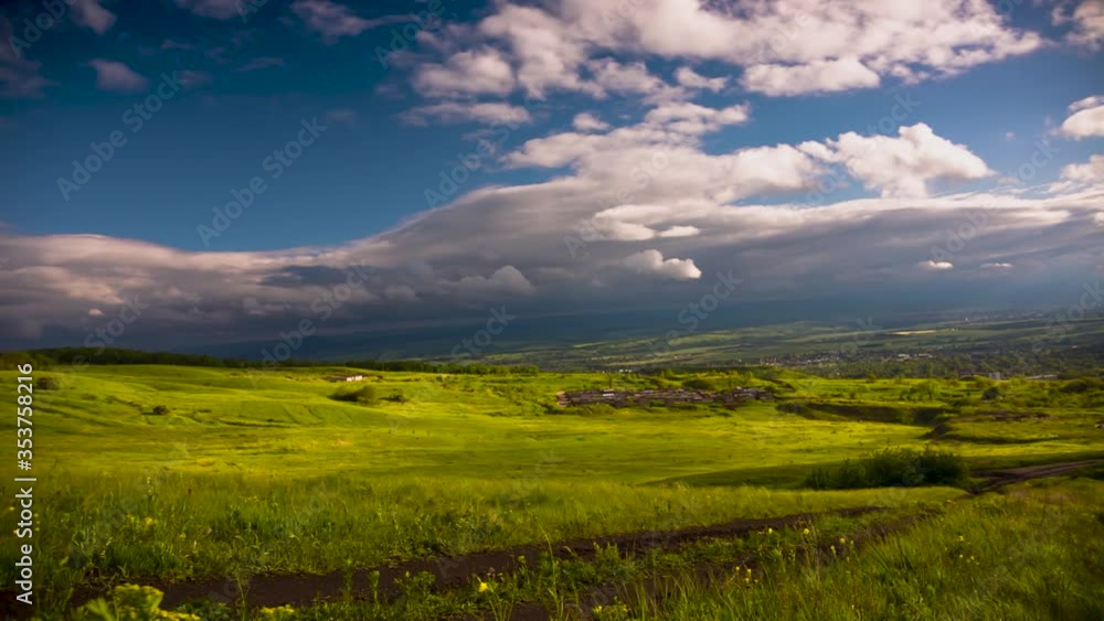 Moving clouds in the blue sky. A panorama after a rain Moving clouds in the blue sky. A panorama after a rain