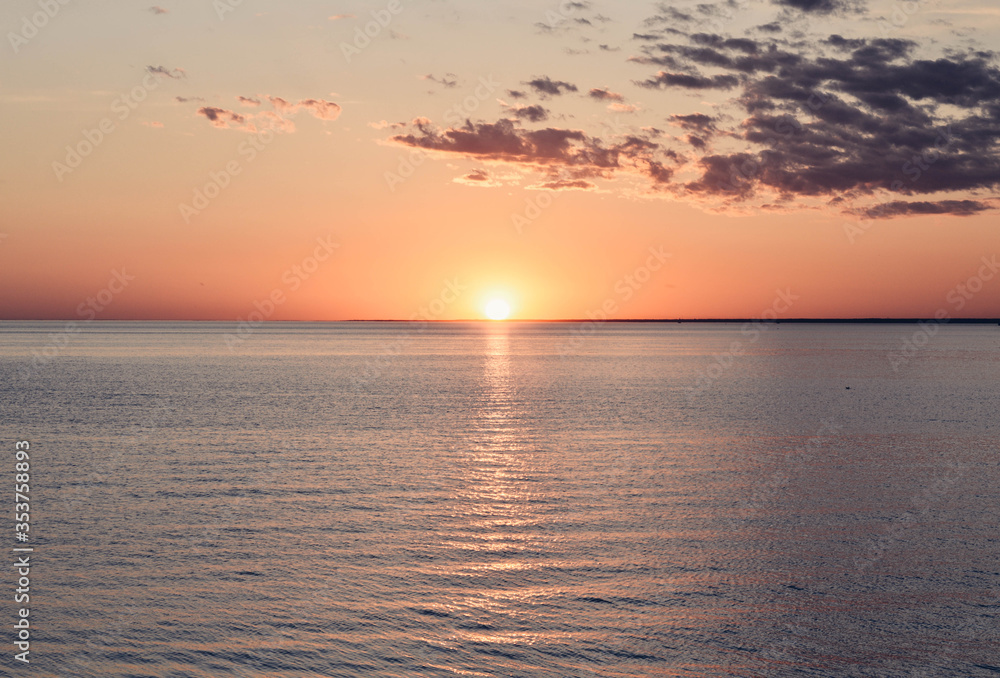 Sunset over the ocean, beautiful clouds Sunset over the ocean, beautiful clouds