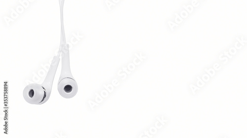 Wallpaper Mural A pair of white headphones in a hanging position isolated on a white background. Torontodigital.ca