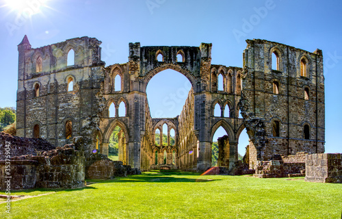 Archs  at Rievaulx Abbey ruins in North York moors national Park, Yorkshire United Kingdom photo
