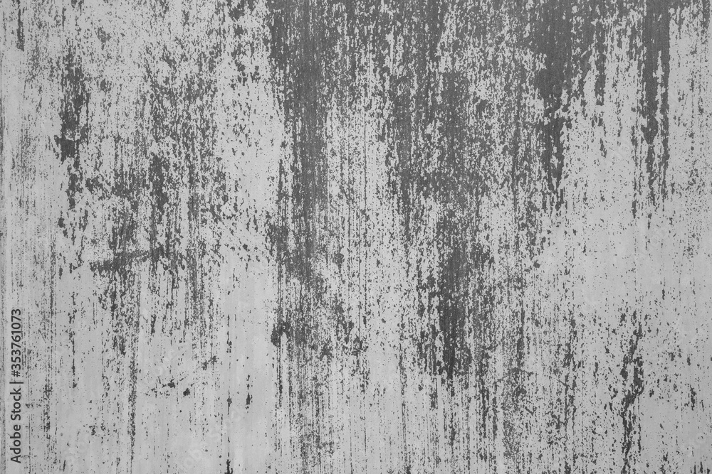 Texture of old grunge concrete wall backgrounds. Liquid dark paint runs down the concrete wall. Perfect background with space. Grain, material.