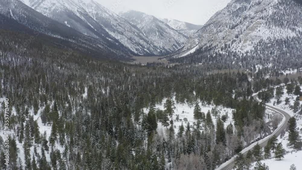 Aerial approach of winter snowy valley in Buena Vista, Colorado, USA Aerial approach of winter snowy valley in Buena Vista, Colorado, USA