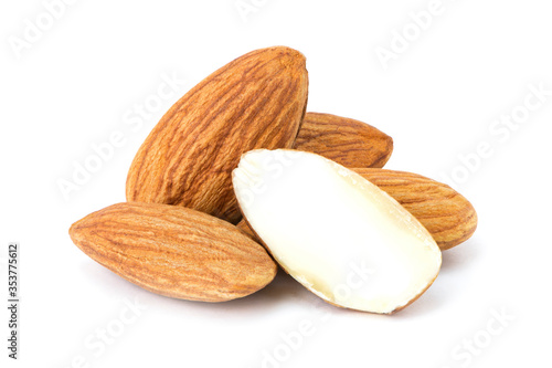 Closeup group of almond nuts and almond slice isolated on white background. 