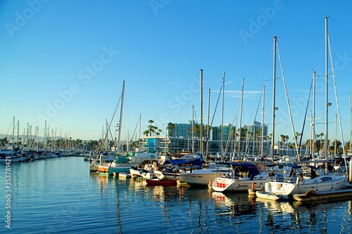 Luxury small boats and yachts at sunset docked in Marina Del Rey © prunette123