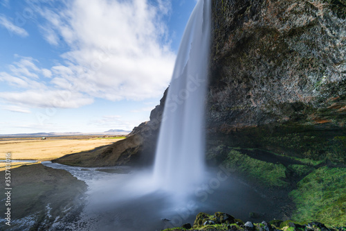 One of the most famous waterfalls in Iceland called Seljalandsfoss is located in the Golden Circle and is easy accessible from the Ring Road