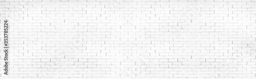 Panoramic background of wide white brick wall texture. suitable for home decoration or office design backdrop.