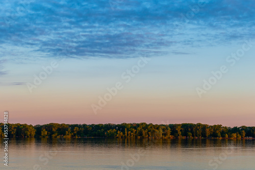 Magic dawn over a wide river © liper06