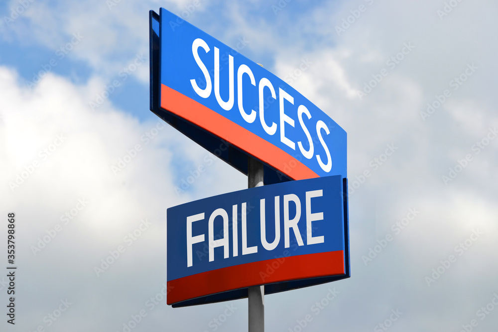 Success and failure street sign Success and failure street sign