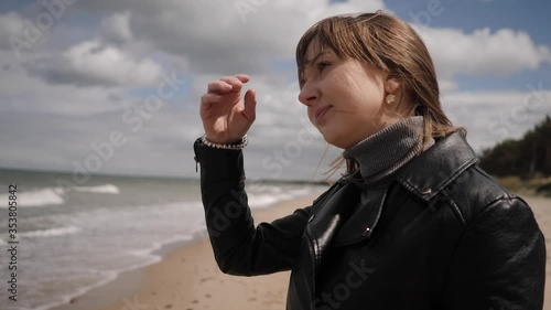 A strong wind during a photo shoot of a young woman