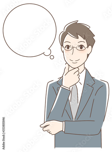 笑顔で想像する男性