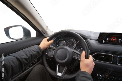 Man in car hold steering wheel.
