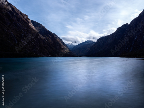 Scenic lake with surrounding mountains in the national park Huascar  n in the Andes of Peru