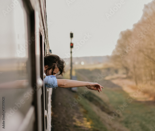 Wallpaper Mural young woman on window  Torontodigital.ca