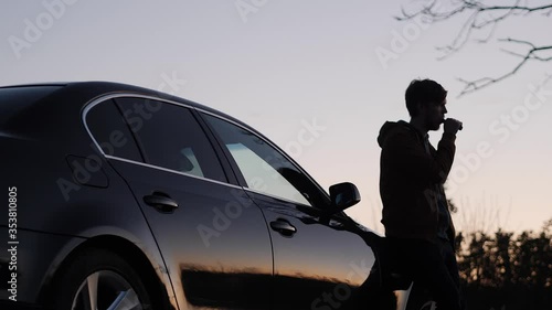 Silhouette of a young man on the road Smoking electronic cigarettes