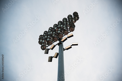 stadium lights on a sunny day