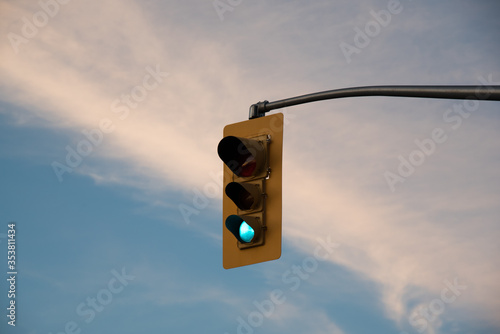 Traffic light green light during sunset