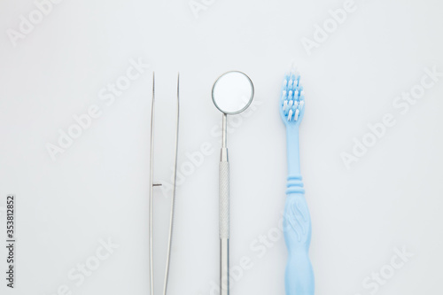 Dentist s tools on white background. Dentistry  medicine  medical equipment and stomatology concept.