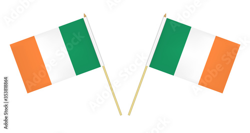 Two small Irish flags isolated on white background, vector illustration. Flag of Ireland on pole