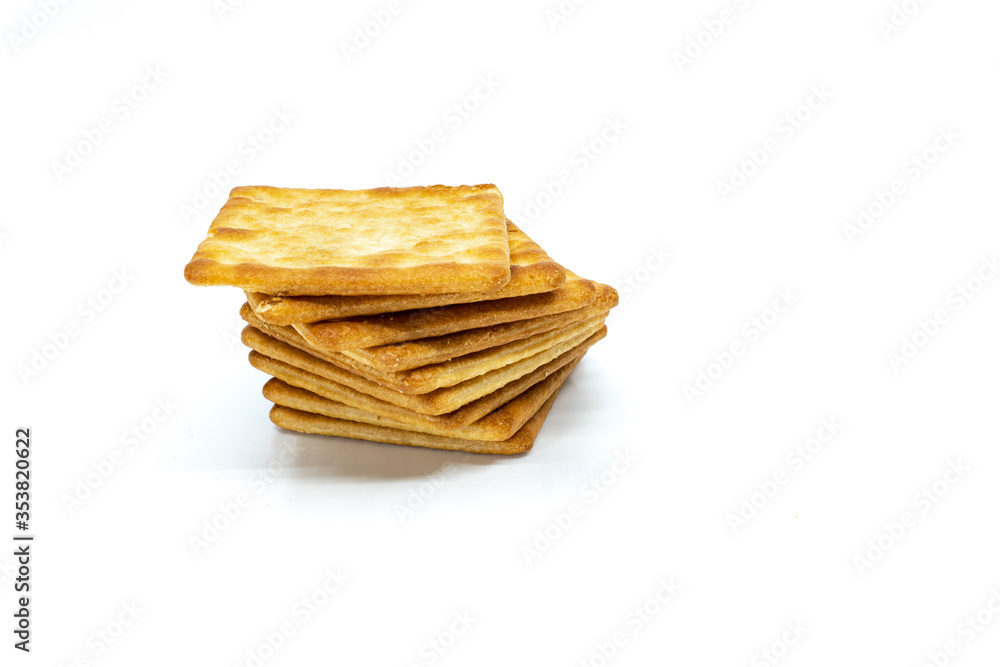 Cream cracker biscuit isolated on white background with copy space.