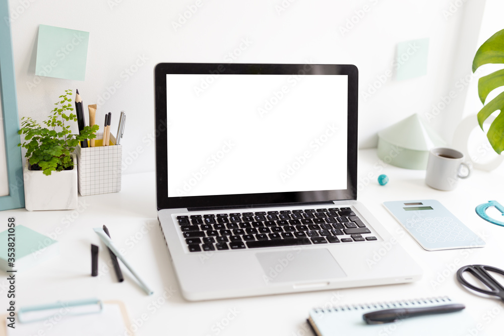 Laptop at trendy home office and books, papers, stationery around, Homeschooling concept. Creative desk.
Laptop at trendy home office and books, papers, stationery around, Homeschooling concept. Creative desk.