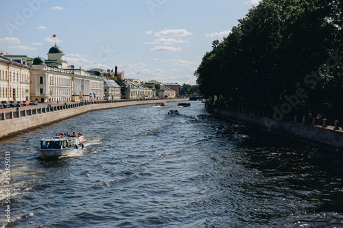 Ships sailing along the Neva River near the Summer Garden in St. Petersburg