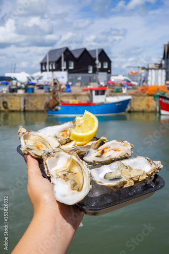 Oysters from Whitstable harbour - a seaside town on the north east coast of Kent, south England photo