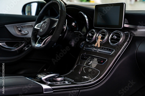 interior of a luxury car, noble materials and quality workmanship © edojob