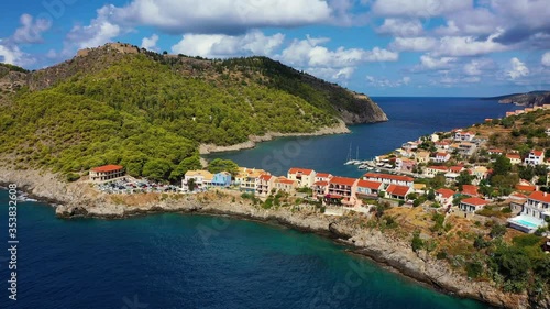 Wallpaper Mural Aerial drone view video of beautiful and picturesque colorful traditional fishing village of Assos in island of Cefalonia, Ionian, Greece. Peninsula of Assos in Cephalonia (Kefalonia), Greece Torontodigital.ca