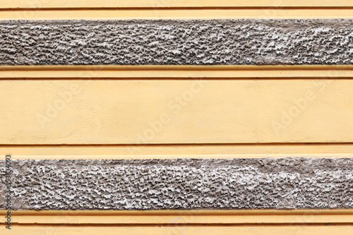 orange textured wall with gray accents 