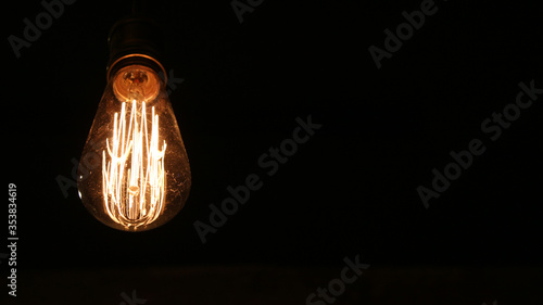 Light bulb close-up on a black background