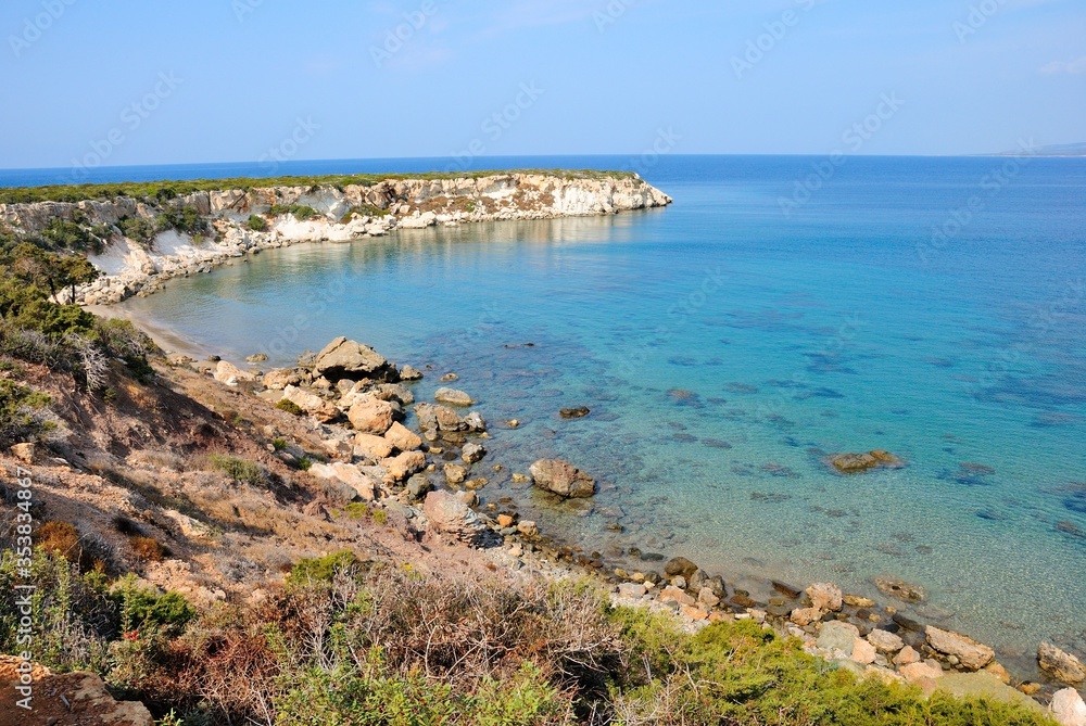 Rocky coast of the Akamas peninsula with the turquoise waters of Mediterranean Sea in northwest extremity of Cyprus Rocky coast of the Akamas peninsula with the turquoise waters of Mediterranean Sea in northwest extremity of Cyprus