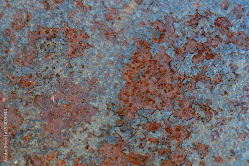 rust on metal, painted metal that has been corroded