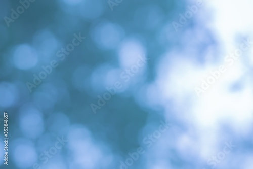 Abstract blue bokeh defocused natural background