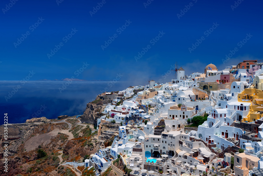 Oia surrounded by clouds