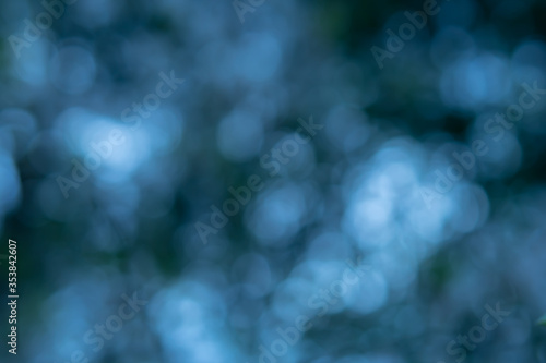 Abstract blue bokeh defocused natural background