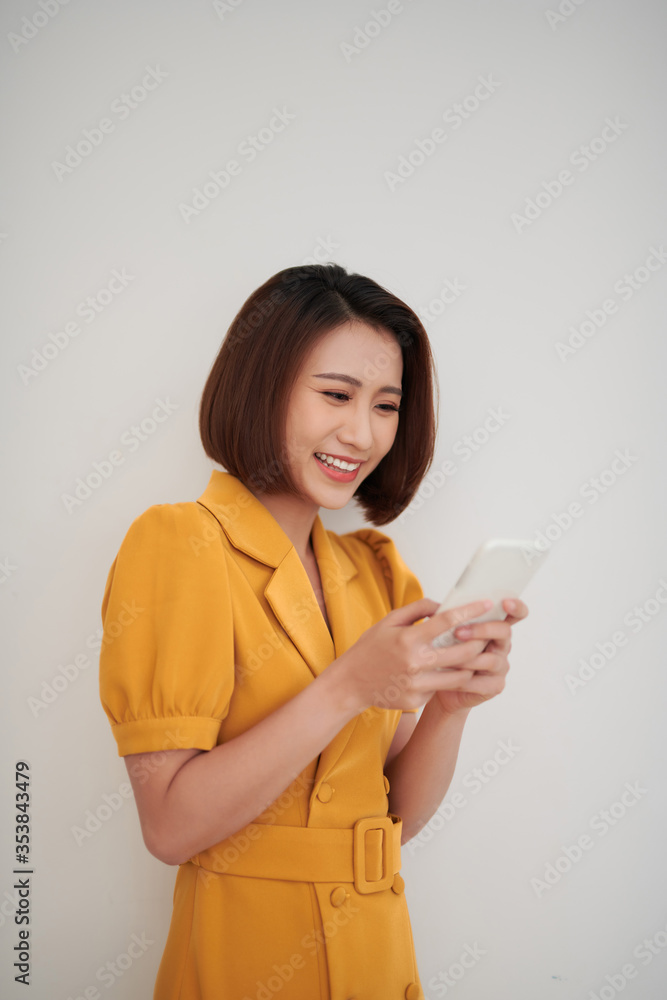 young attractive asian woman to see a smart phone young attractive asian woman to see a smart phone